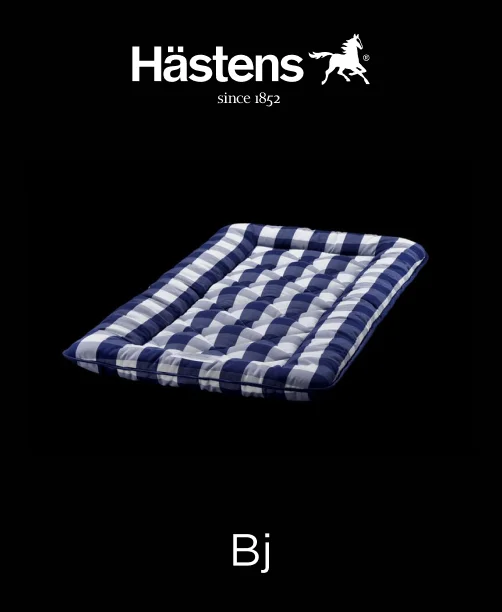 Plush white Hastens BJ mattress topper laid on top of a mattress